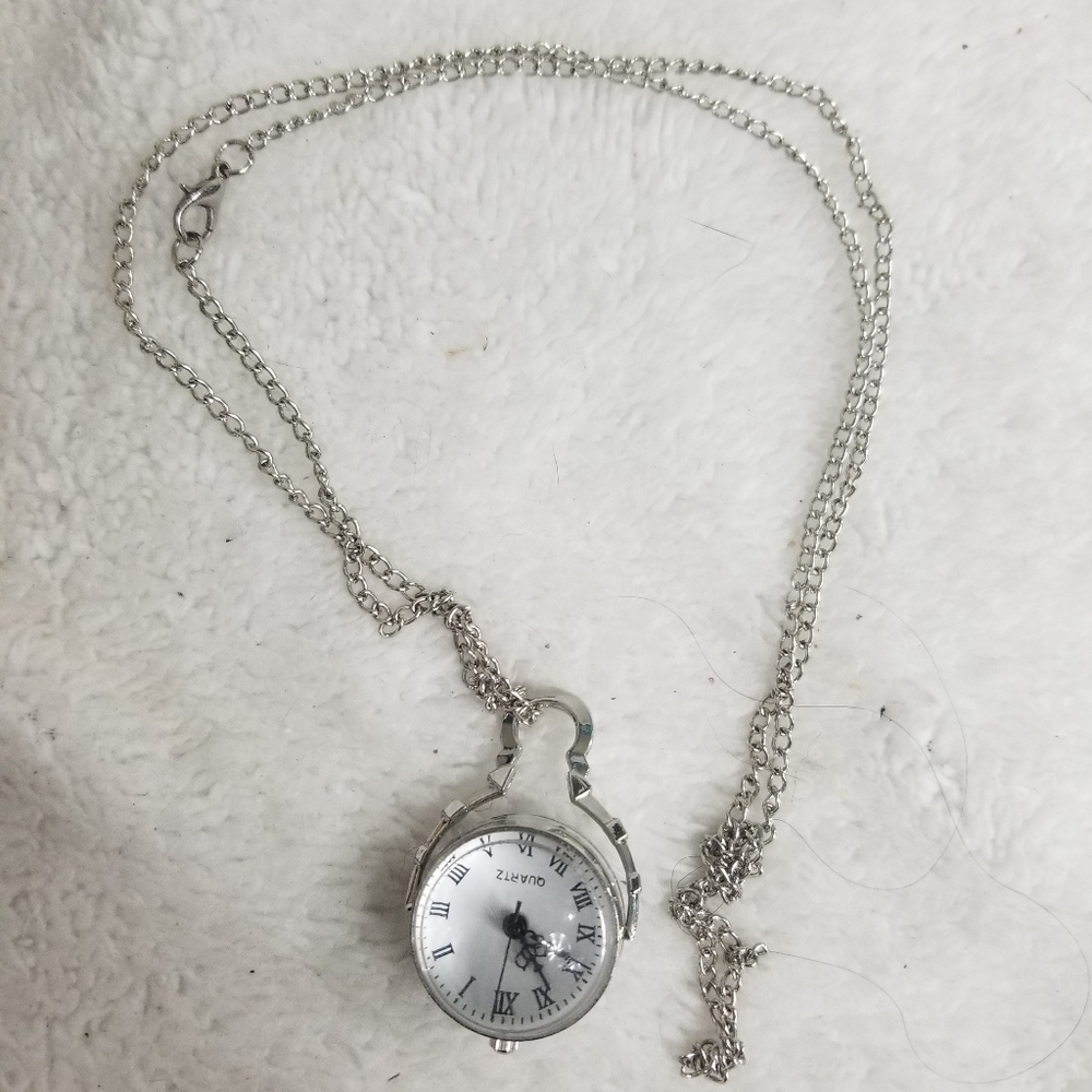 Silvertone Pendulum Sphere Quartz watch